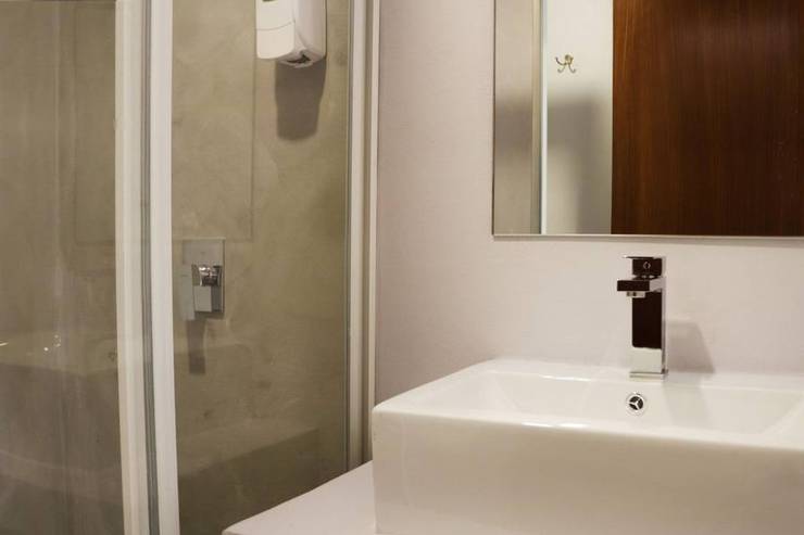 Antes · Baño con obra de instalación